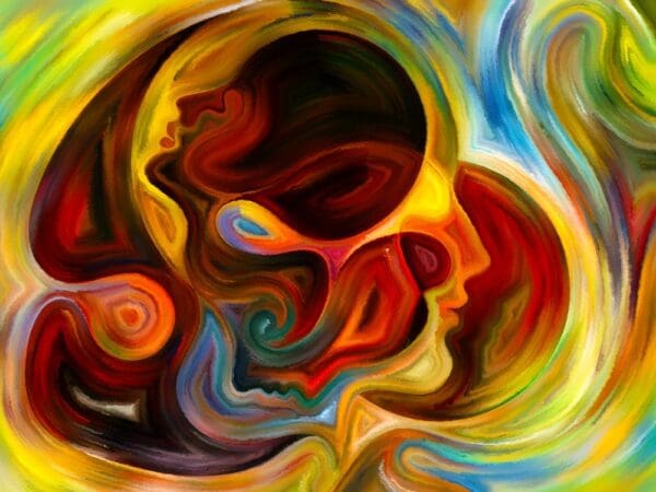 abstract two heads one side on and other tilted upwards swirling in colours